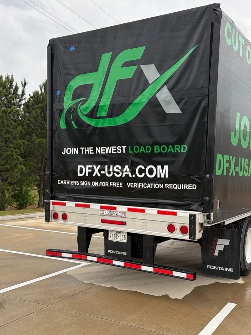 Recently completed box truck wrap with green graphics